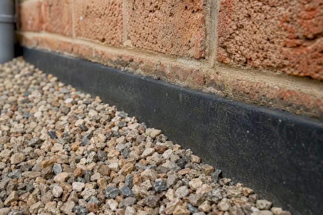 Masonry wall with visible damp-proof course detail
