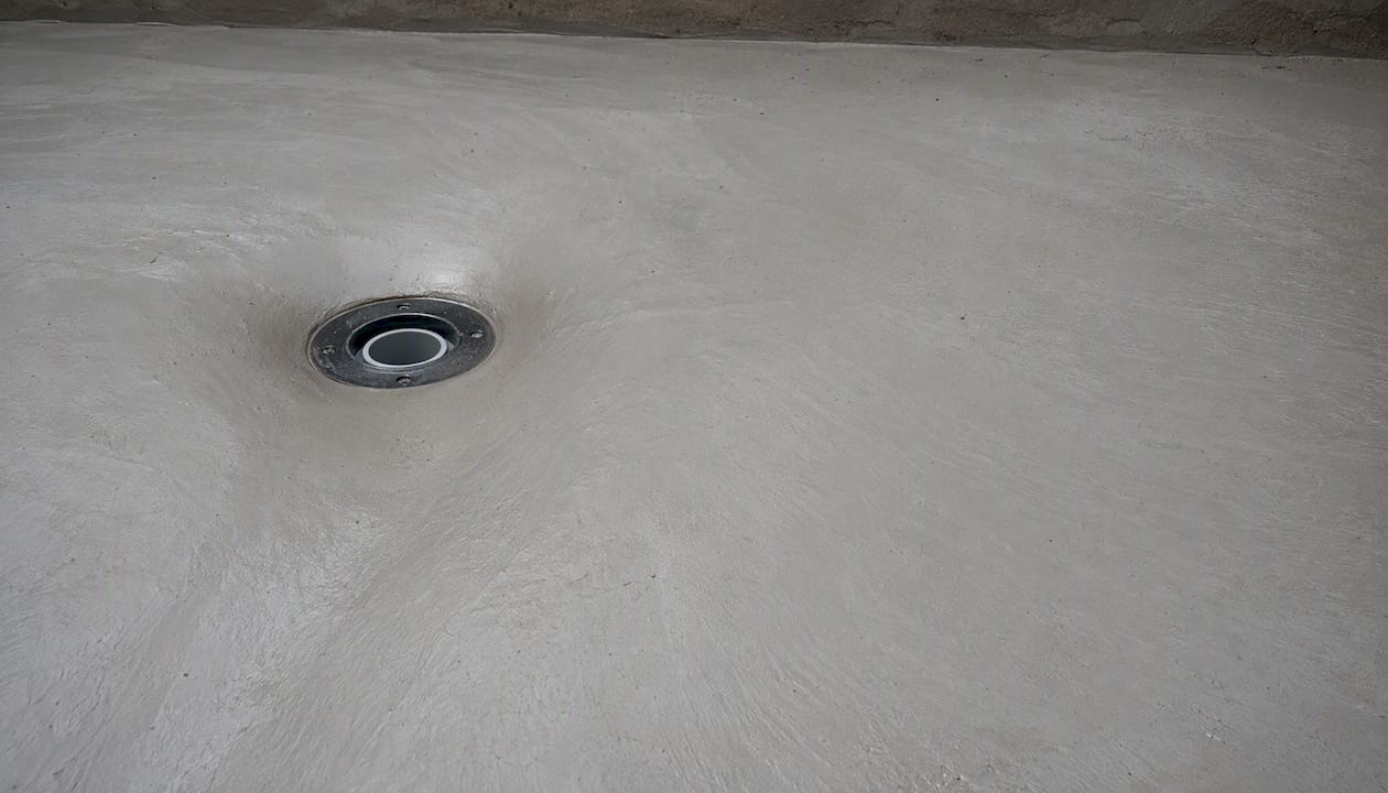 Close-up of roof outlet with concrete slope