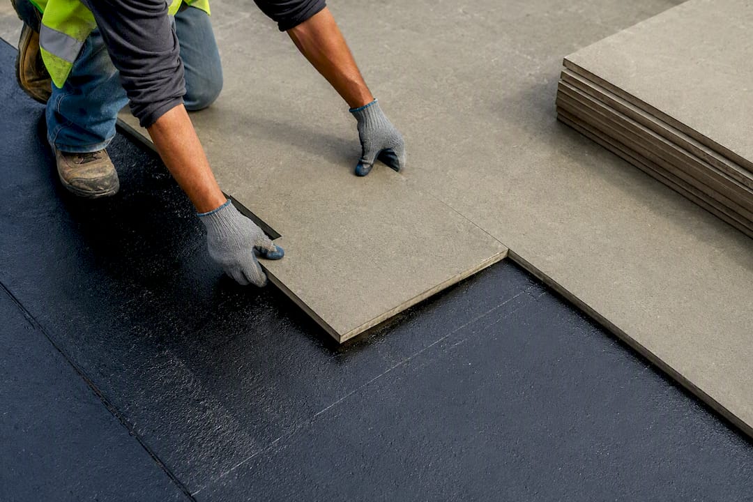 Protective boards over fresh membrane